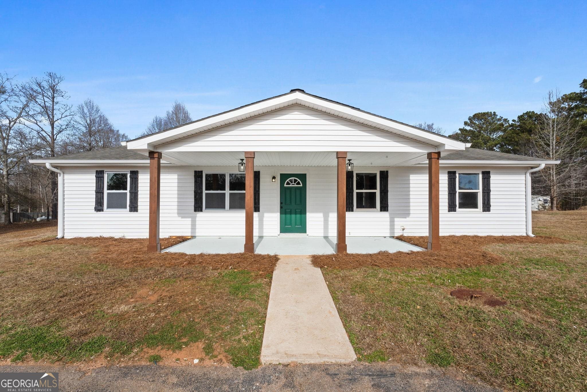 767 Sowell Road McDonough, GA 30252 - Photo 1 of 1 a front view of a house with yard