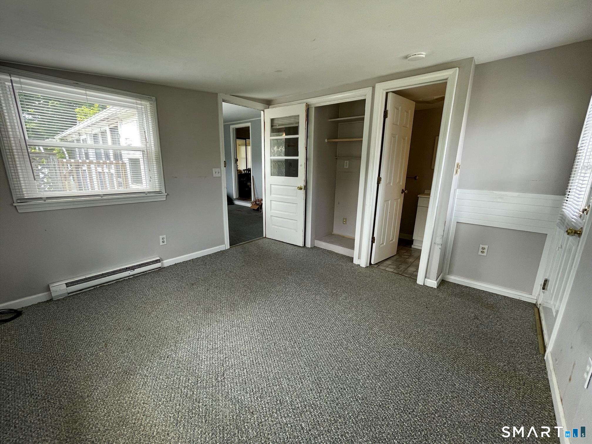 18 Old South Cove Road Old Saybrook, CT 06475 - Photo 37 of 40 an empty room with windows