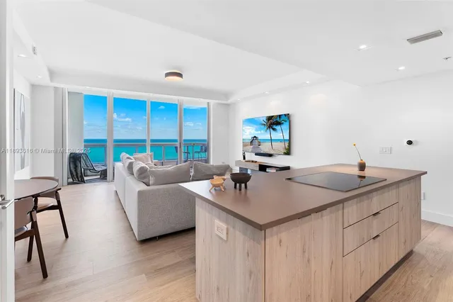 a kitchen with sink and view