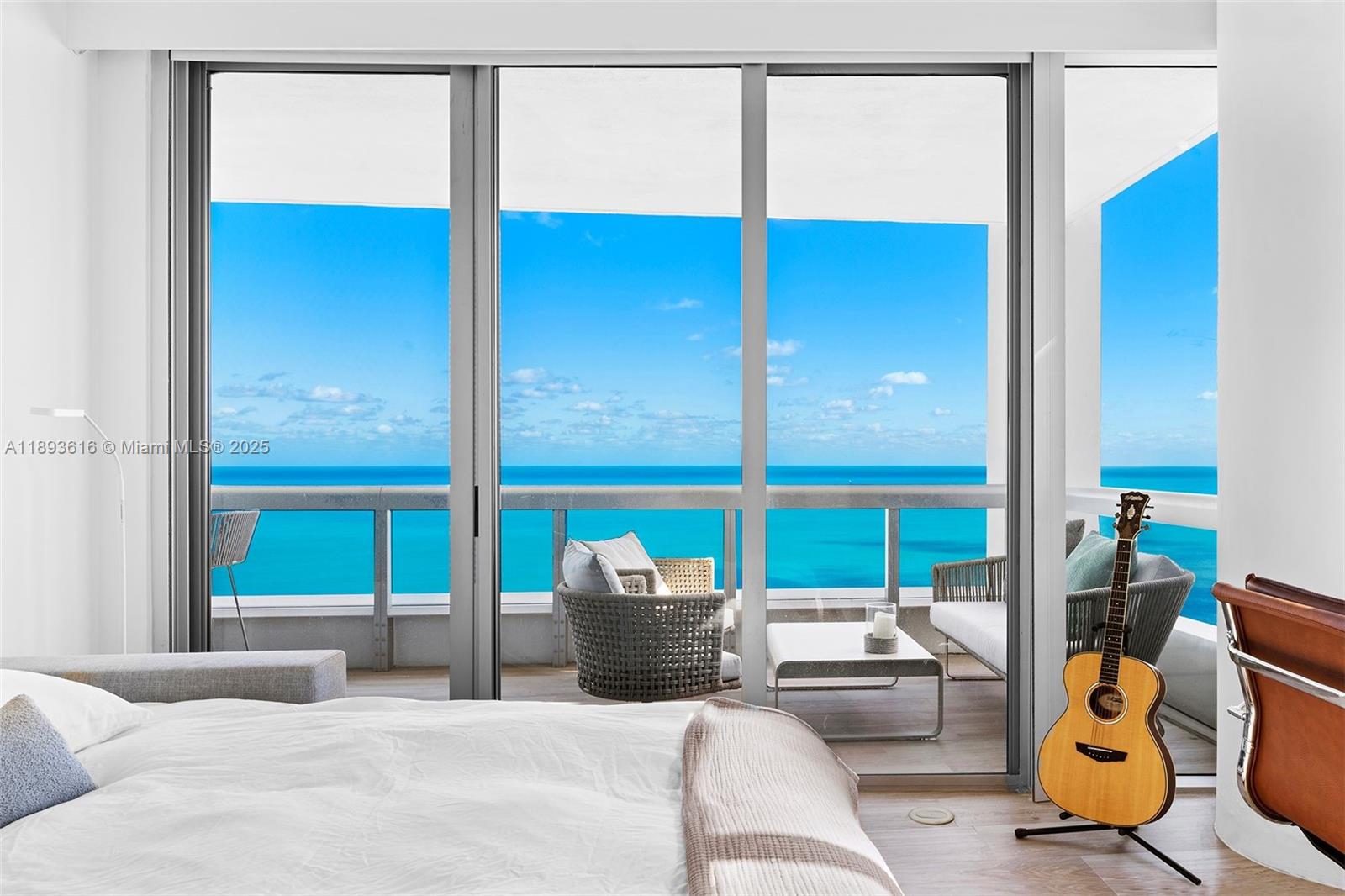 6899 Collins Avenue, Unit 2601 Miami Beach, FL 33141 - Photo 47 of 70 a bedroom with furniture and a window