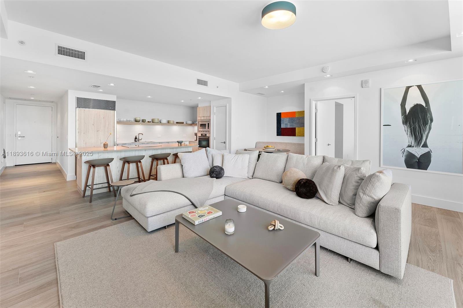 6899 Collins Avenue, Unit 2601 Miami Beach, FL 33141 - Photo 9 of 70 a living room with furniture