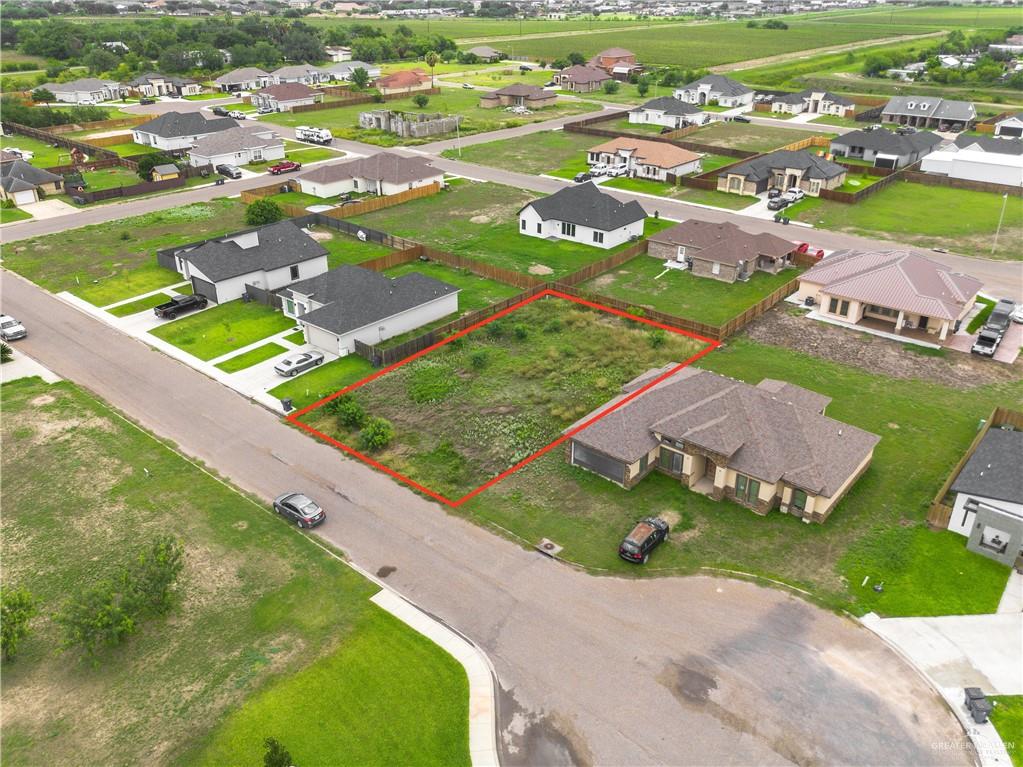 1741 Vincent Street Donna, TX 78537 - Photo 2 of 10 an aerial view of residential houses with outdoor space and river