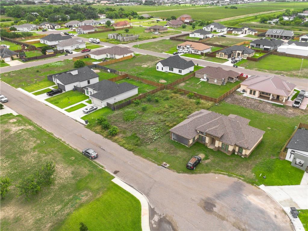 1741 Vincent Street Donna, TX 78537 - Photo 5 of 10 an aerial view of residential houses with outdoor space