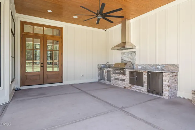 a view of a city with lush green forest