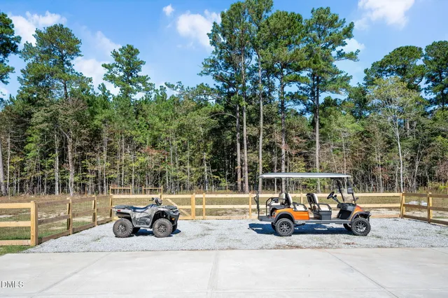 a backyard of a house with lots of green space