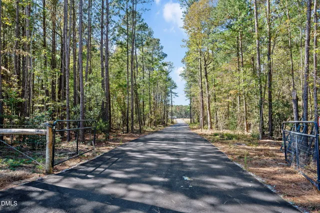 a view of balcony with furniture and garden