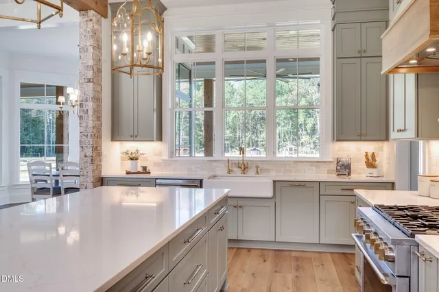 a dining room with furniture window and wooden floor