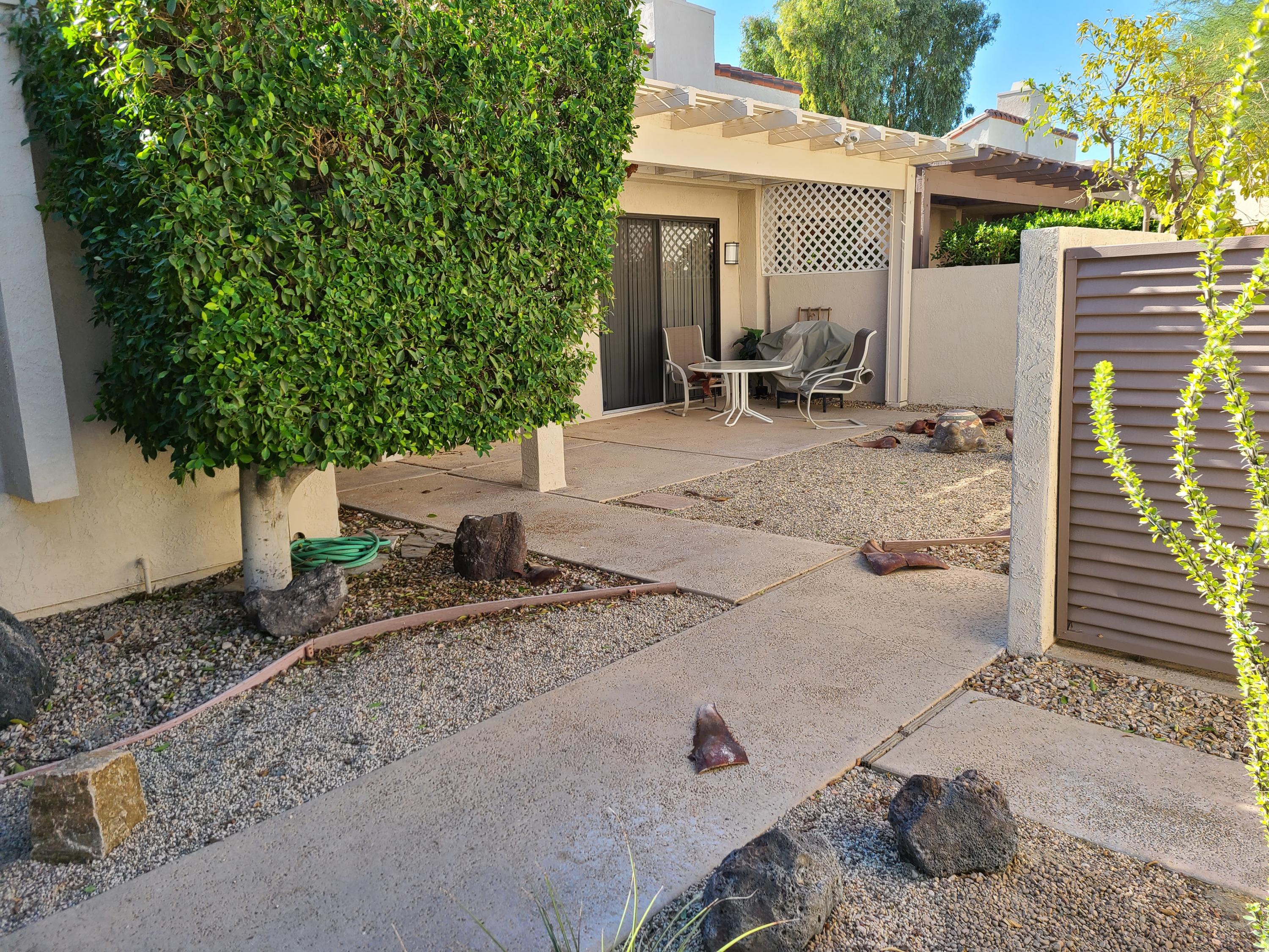 825 Inverness Drive Rancho Mirage, CA 92270 - Photo 13 of 34 a view of a house with backyard