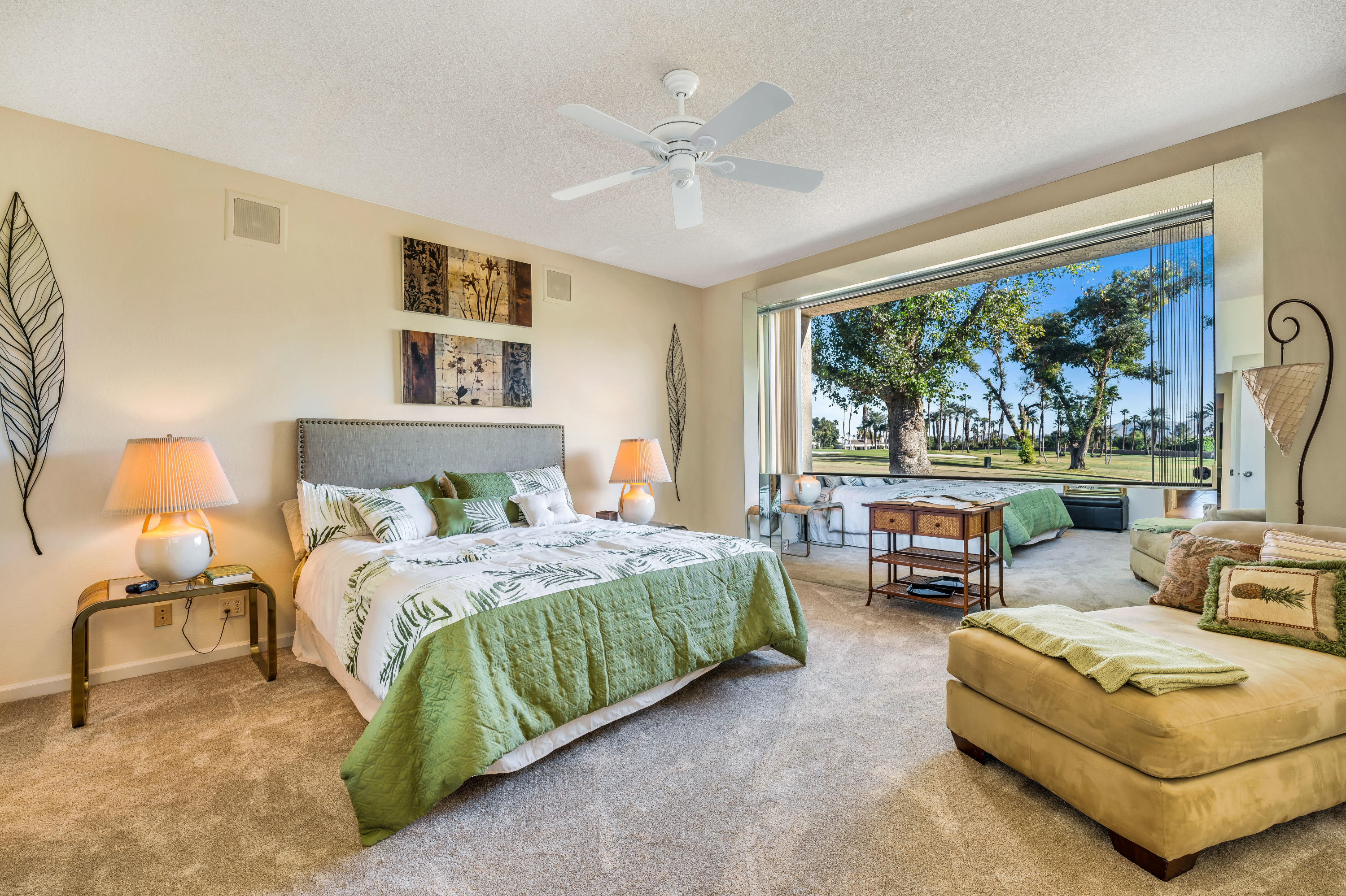 825 Inverness Drive Rancho Mirage, CA 92270 - Photo 20 of 34 a bedroom with a bed and a couch