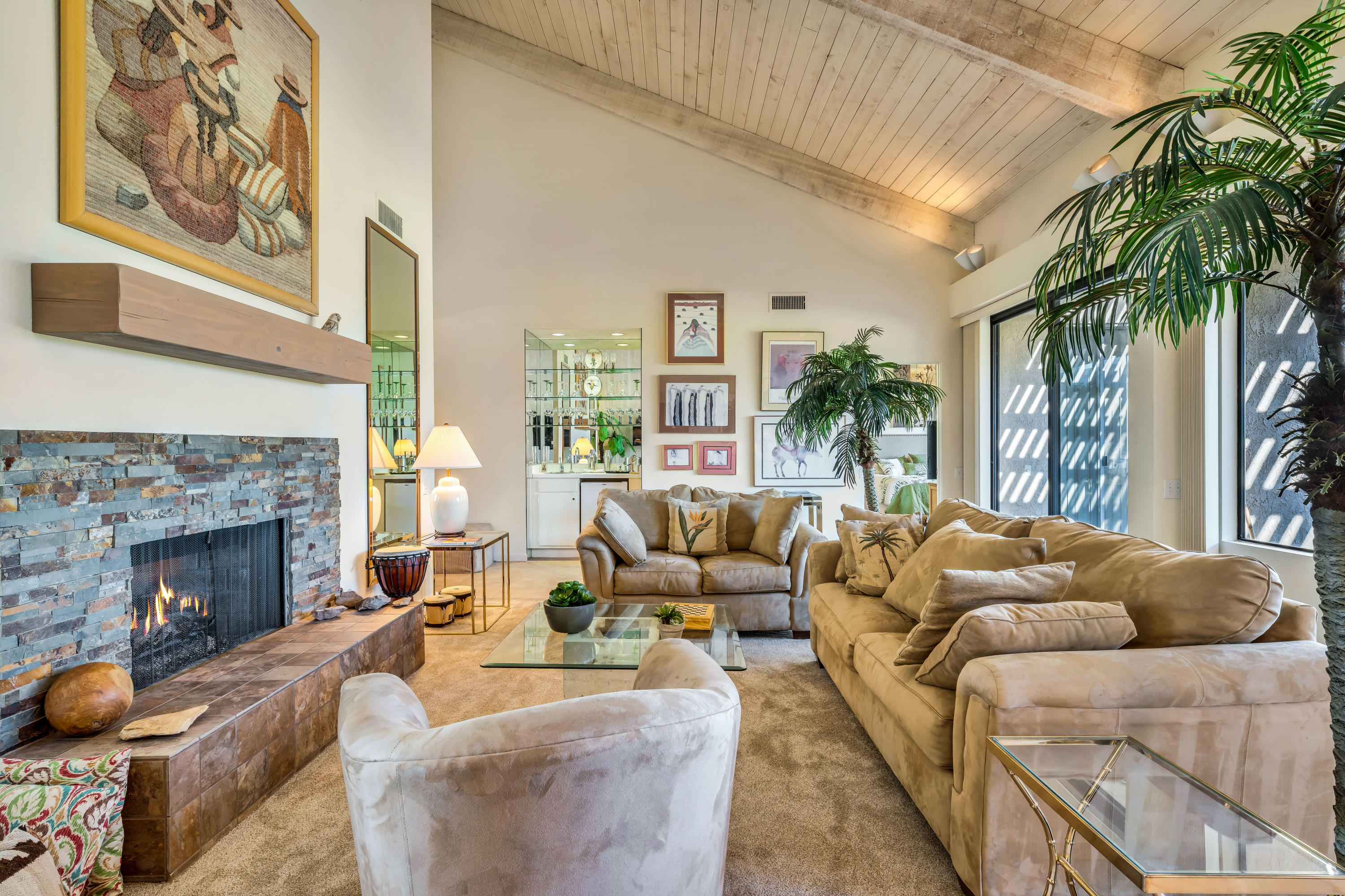 825 Inverness Drive Rancho Mirage, CA 92270 - Photo 29 of 34 a living room with furniture and a fireplace