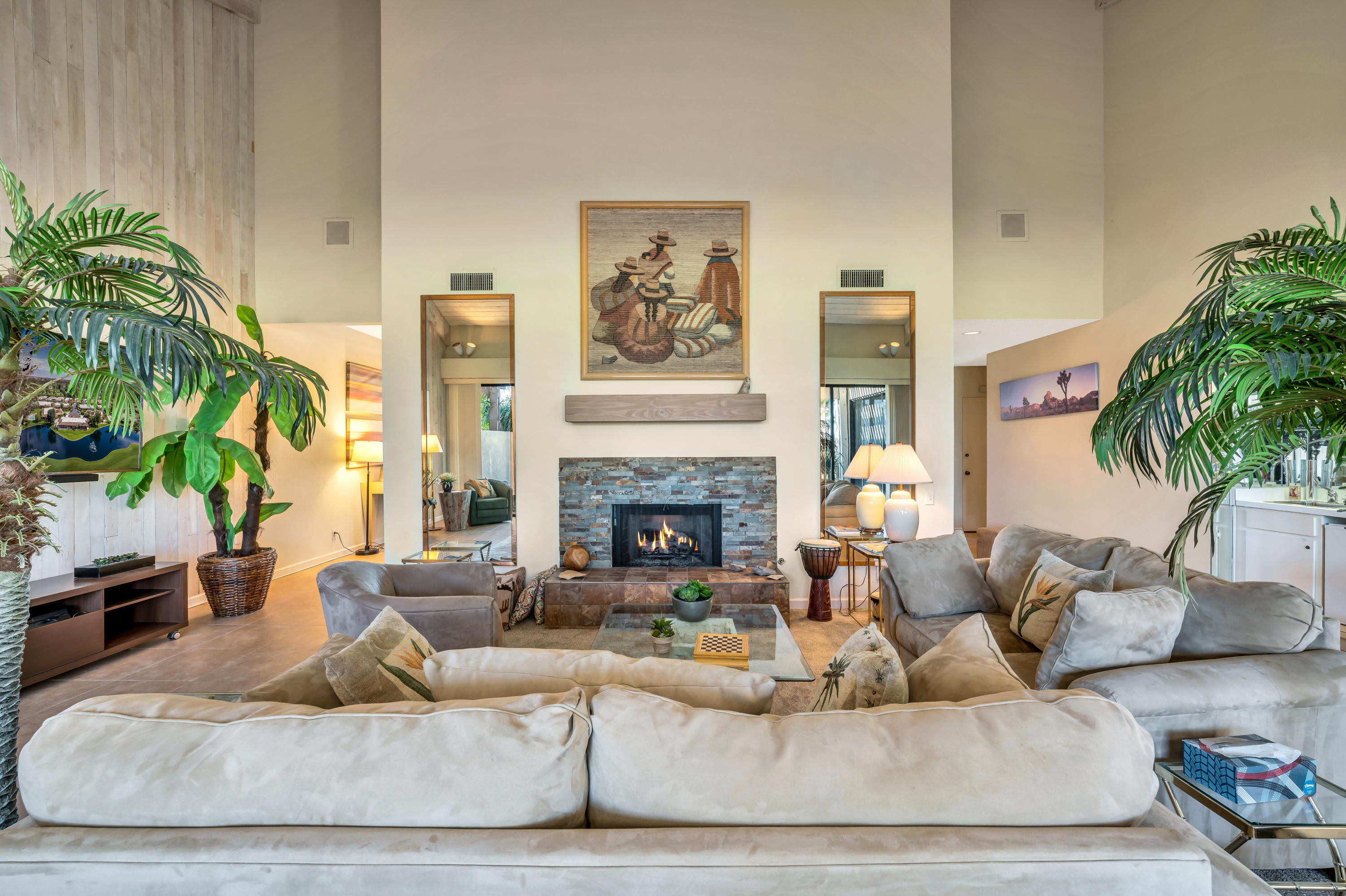 825 Inverness Drive Rancho Mirage, CA 92270 - Photo 6 of 34 a living room with furniture and a fireplace