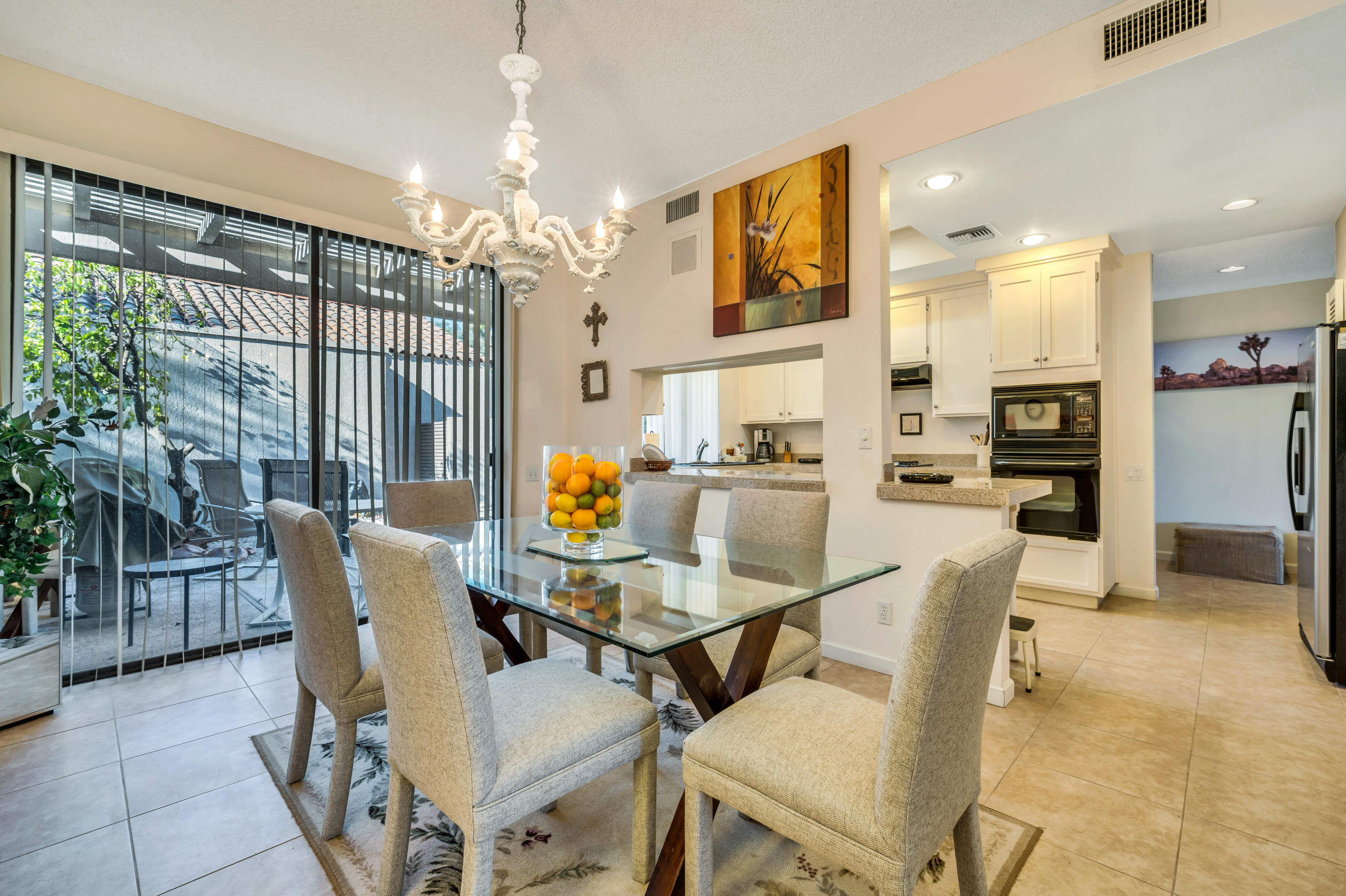 825 Inverness Drive Rancho Mirage, CA 92270 - Photo 9 of 34 a view of a dining room with furniture