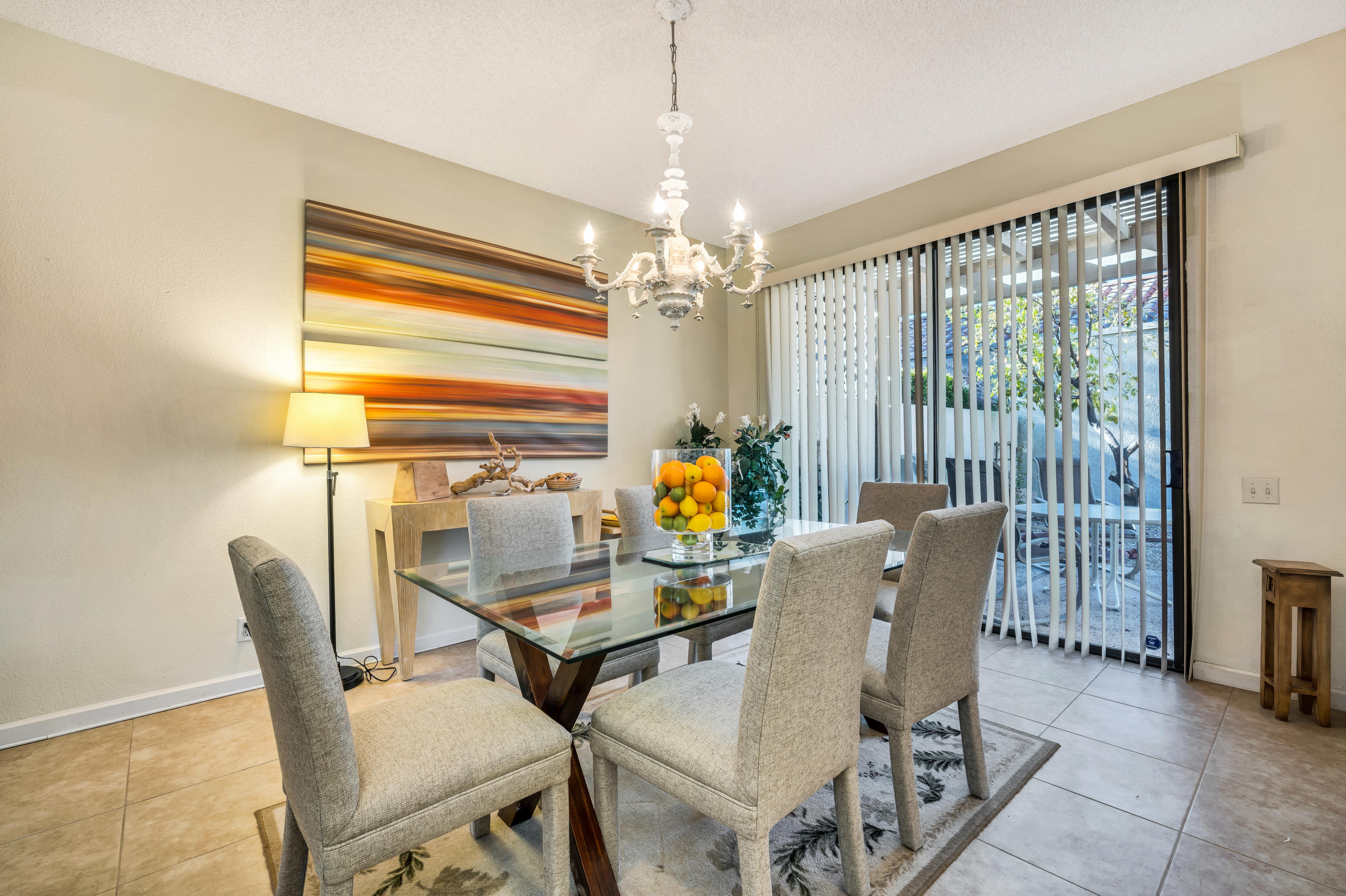 825 Inverness Drive Rancho Mirage, CA 92270 - Photo 10 of 34 a view of a dining room with furniture and window