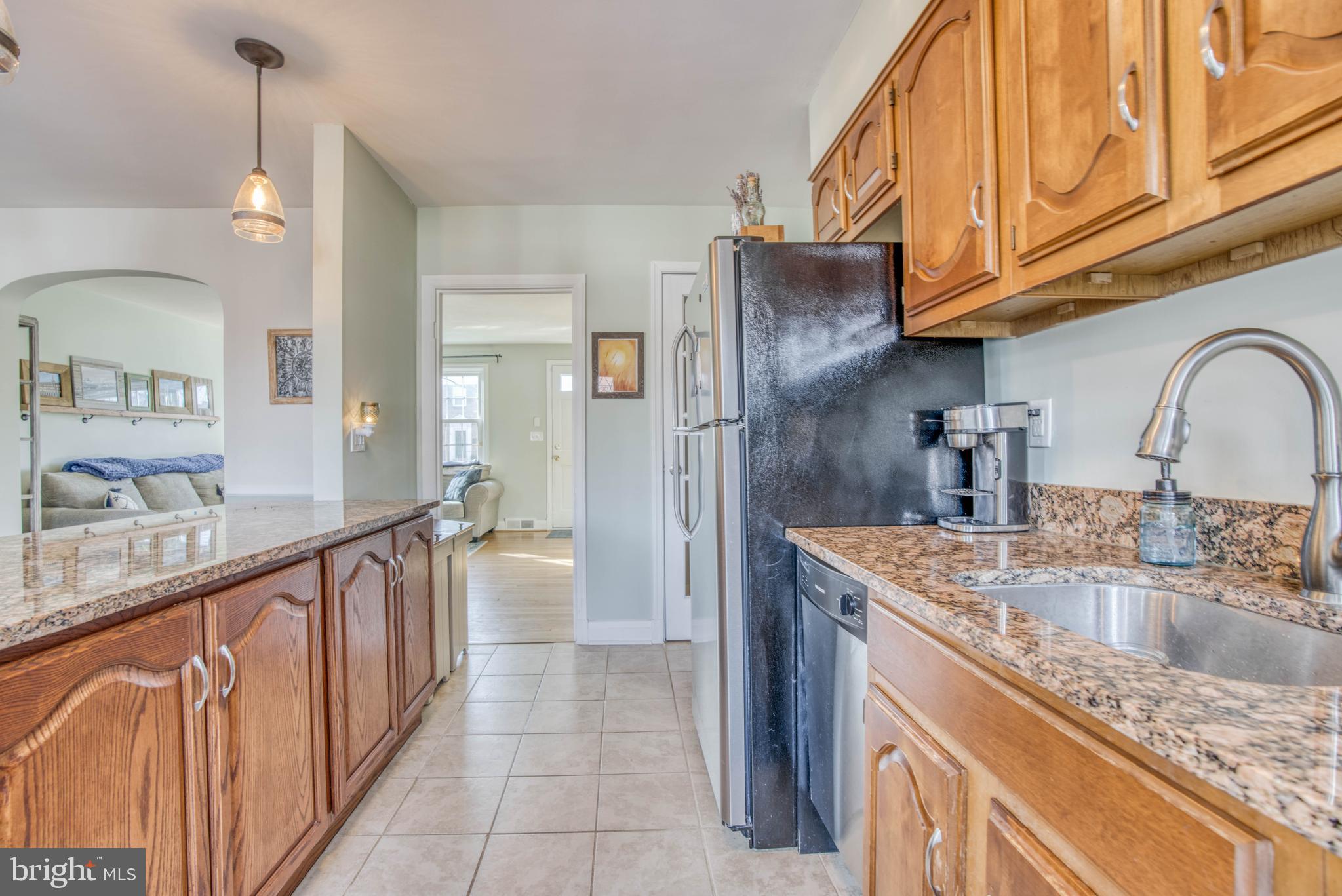 130 Hopkins Road Baltimore, MD 21212 - Photo 20 of 52 a kitchen with stainless steel appliances granite countertop a sink and refrigerator