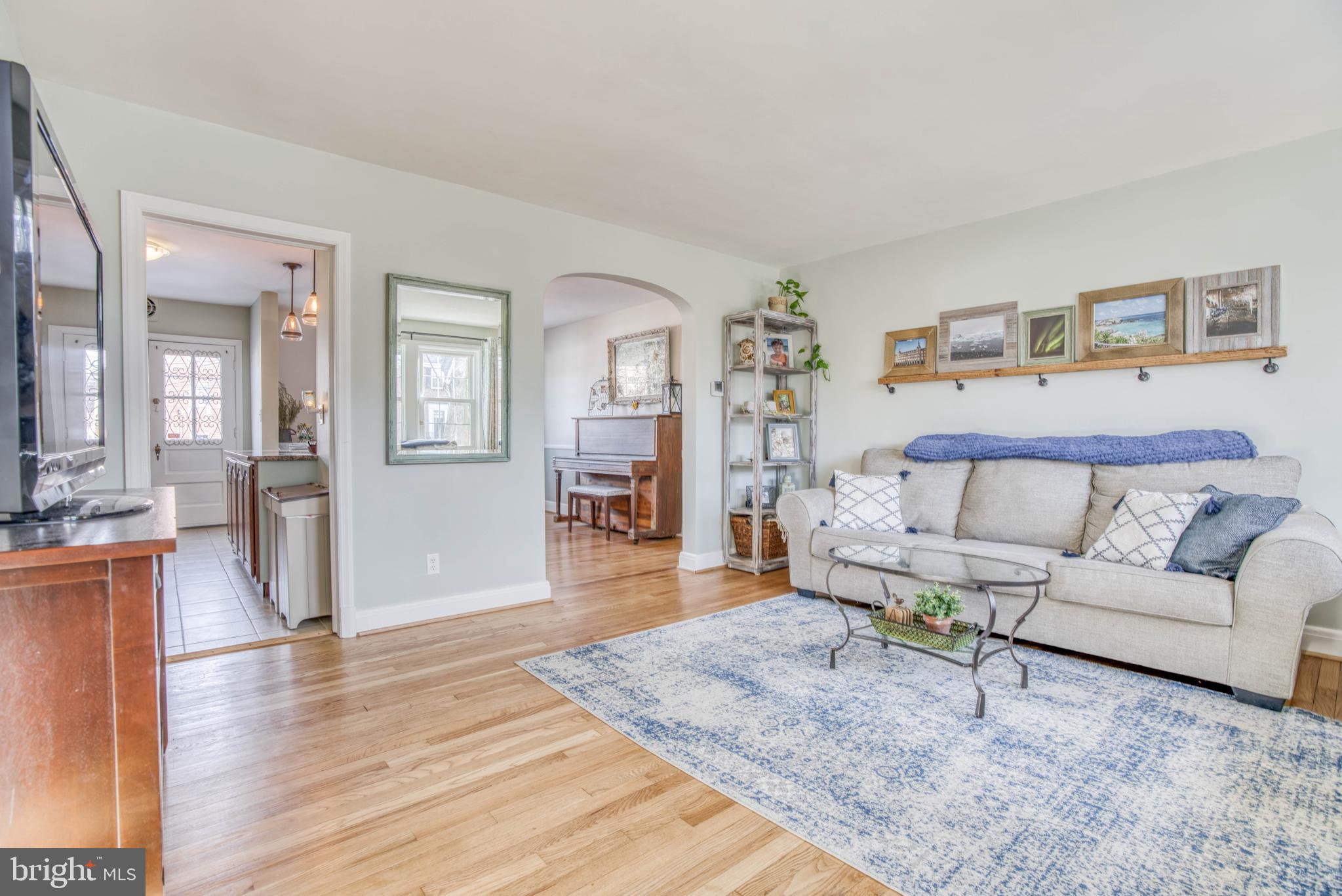 130 Hopkins Road Baltimore, MD 21212 - Photo 5 of 52 a living room with furniture and a wooden floor