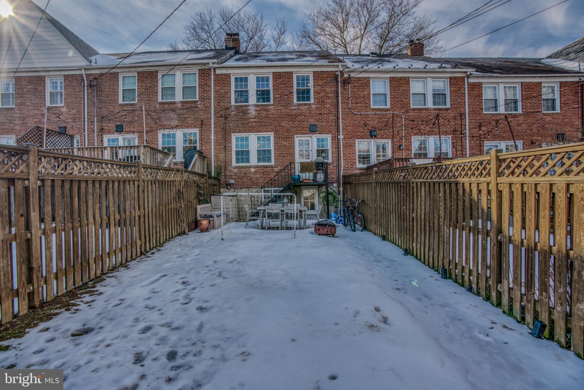 130 Hopkins Road Baltimore, MD 21212 - Photo 49 of 52 a view of a brick house with many windows