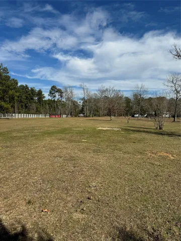 a view of an ocean beach and mountain