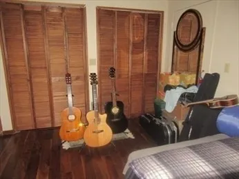 a view of a balcony with table and chairs