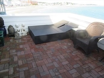 35 Oceanside Drive, Unit 35 Hull, MA 02045 - Photo 20 of 20 a living room with couches and a rug