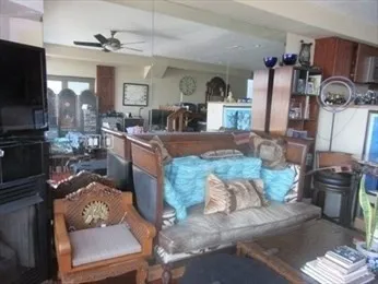 a living room with furniture and a window