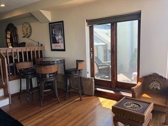 35 Oceanside Drive, Unit 35 Hull, MA 02045 - Photo 8 of 20 a living room with furniture and a window