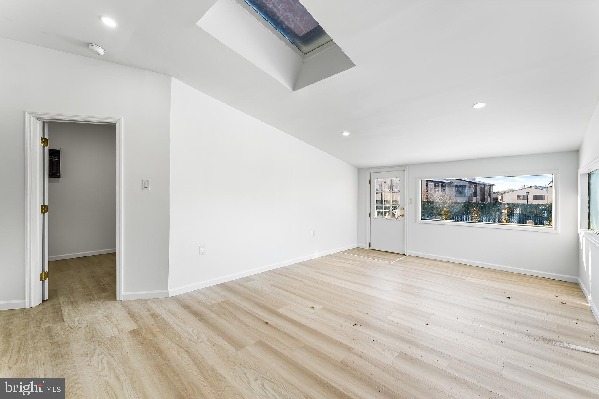 14 Rigel Court Sewell, NJ 08080 - Photo 16 of 40 an empty room with wooden floor and windows
