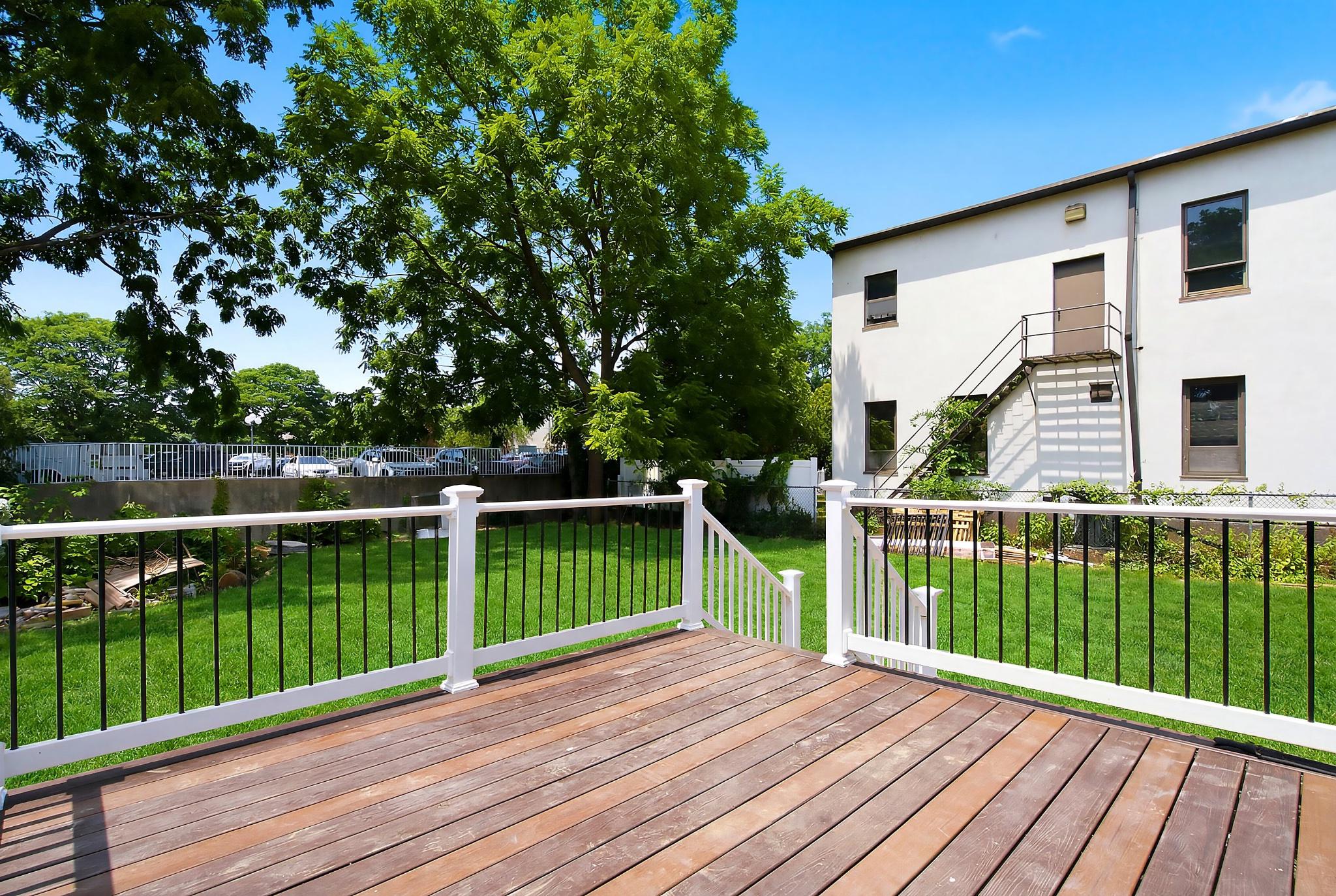 2589 Yardville Hamilton Square Road Hamilton, NJ 08690 - Photo 22 of 24 Sunny backyard retreat. AI generated grass