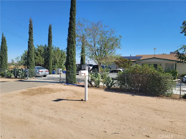 a view of road with houses