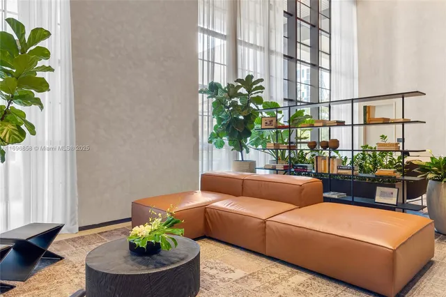 a potted plant sitting on a floor with a potted plant