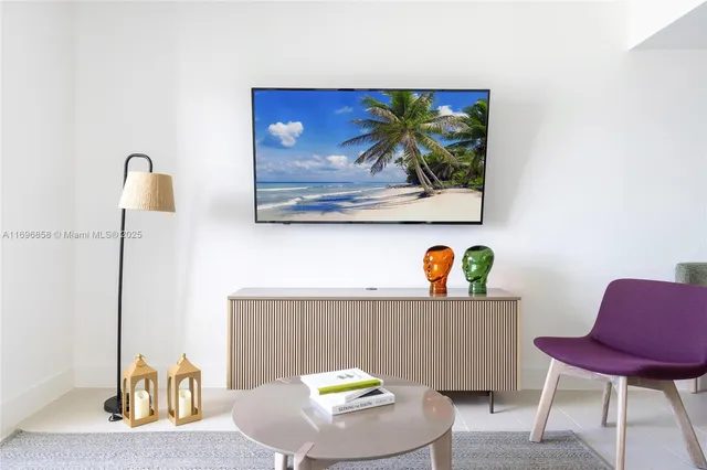 a workspace with furniture and painting on the wall