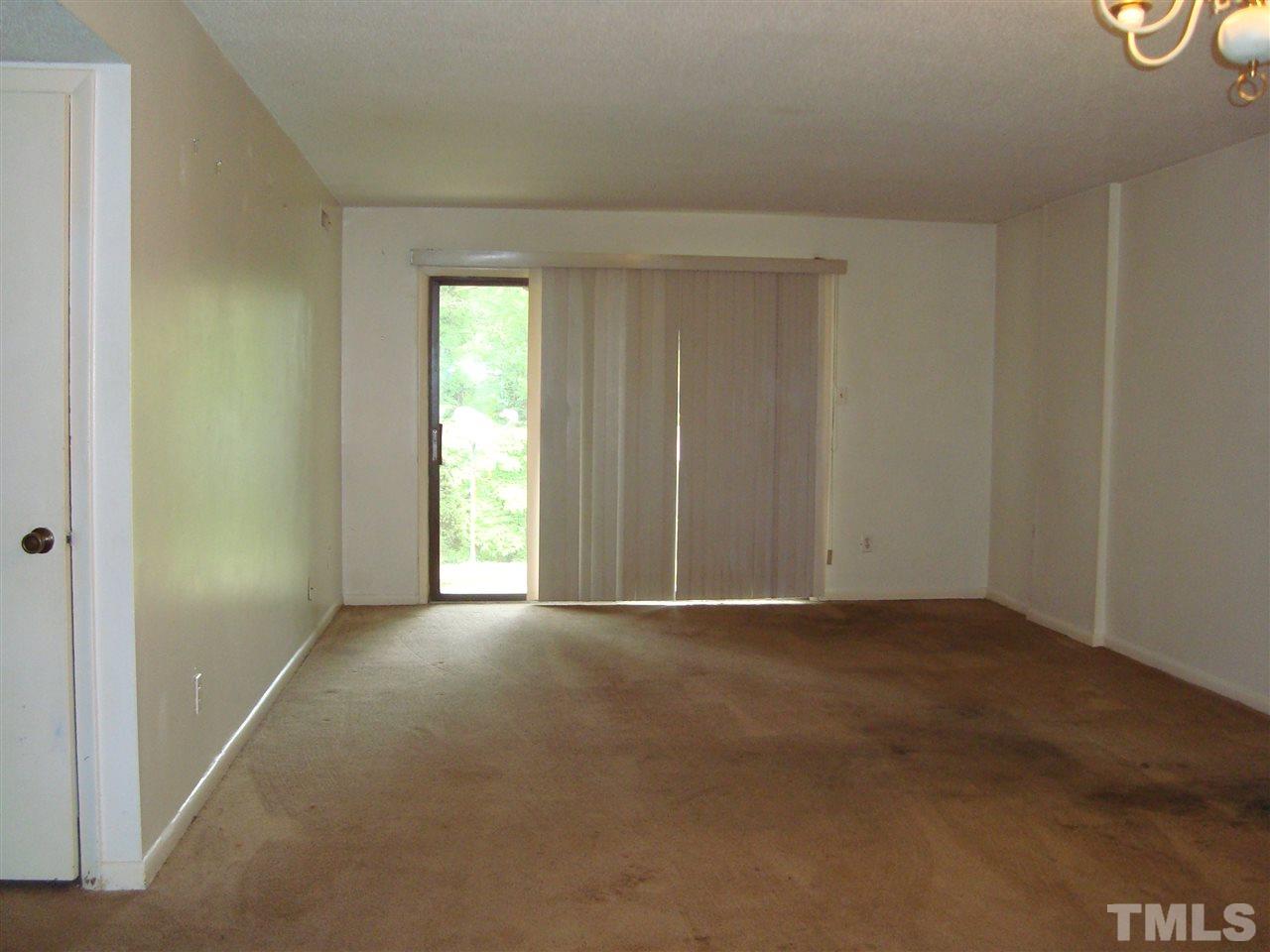 5104 Flint Ridge Place, Unit 5104 Raleigh, NC 27609 - Photo 12 of 12 a view of an empty room with a window