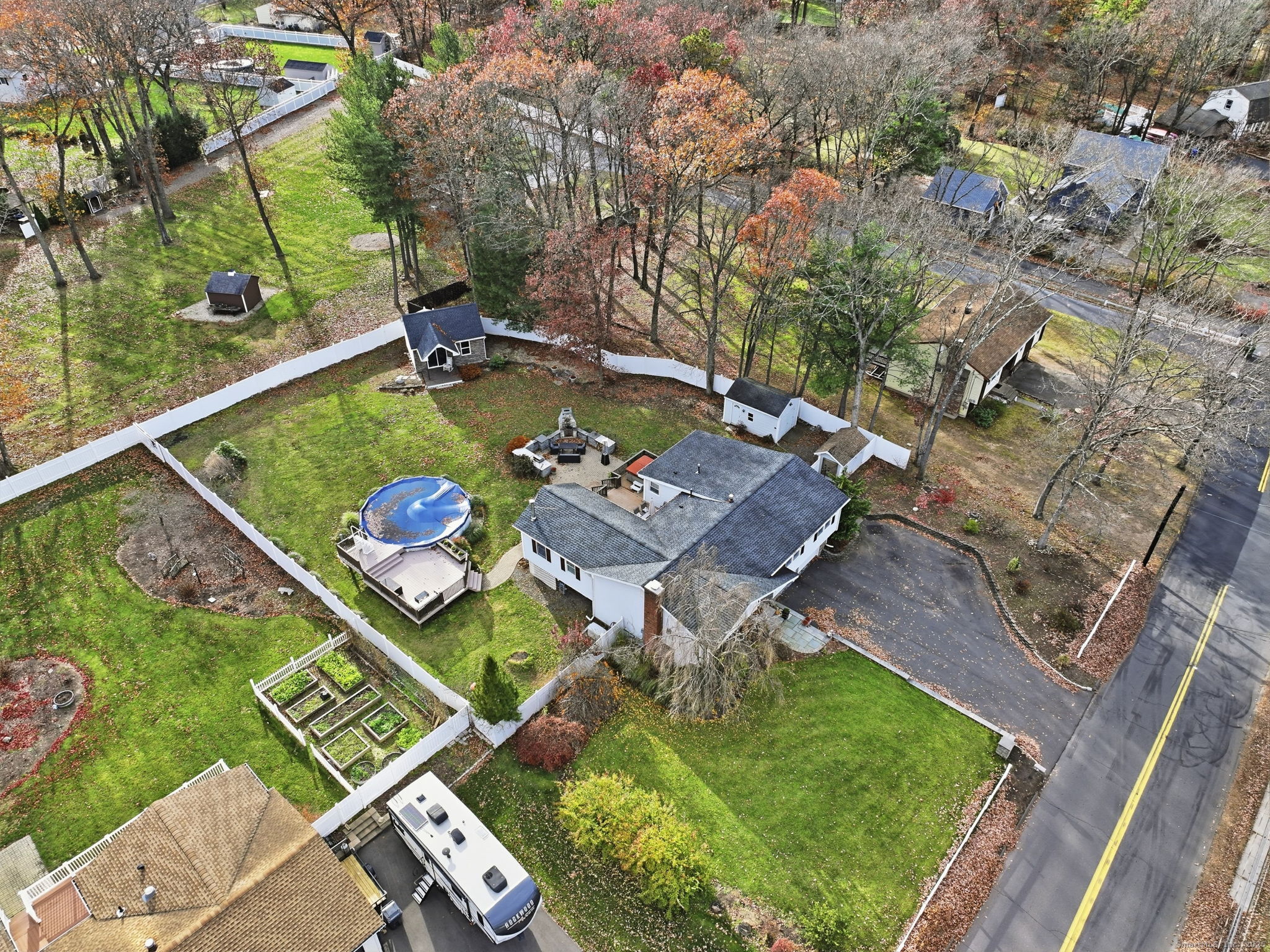 484 Jude Lane Southington, CT 06489 - Photo 29 of 40 an aerial view of a house with a garden and swimming pool