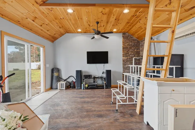 a view of a dinning table and chairs in the patio