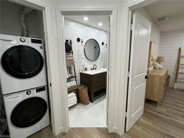 a close view of a utility room with washer and dryer