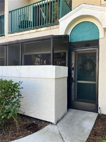 a view of entrance gate of a house