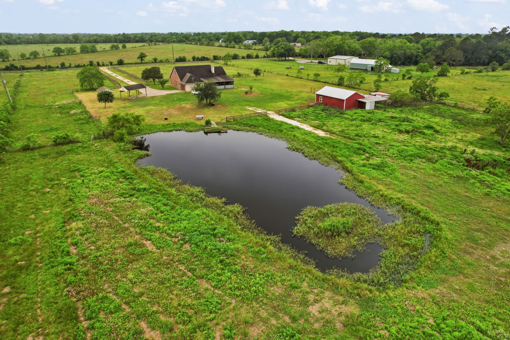 1405 Big Hill Road Winnie, TX 77665 - Photo 7 of 43 a view of a lake with outdoor space