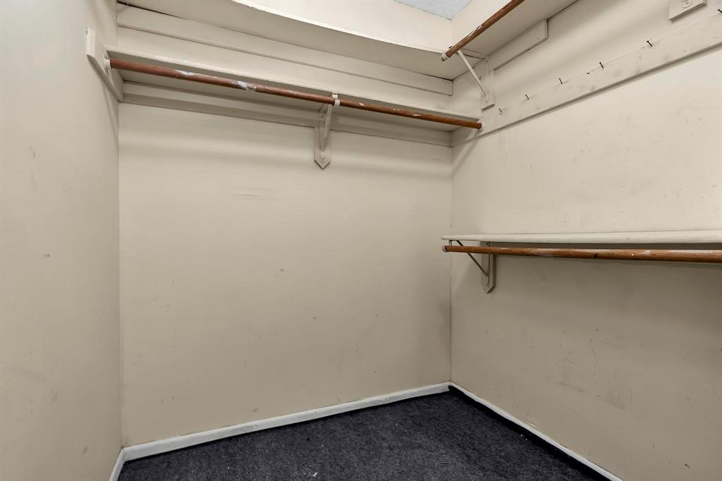 602 Southwest 99th Place Miami, FL 33174 - Photo 23 of 42 a view of a room with racks on the wall