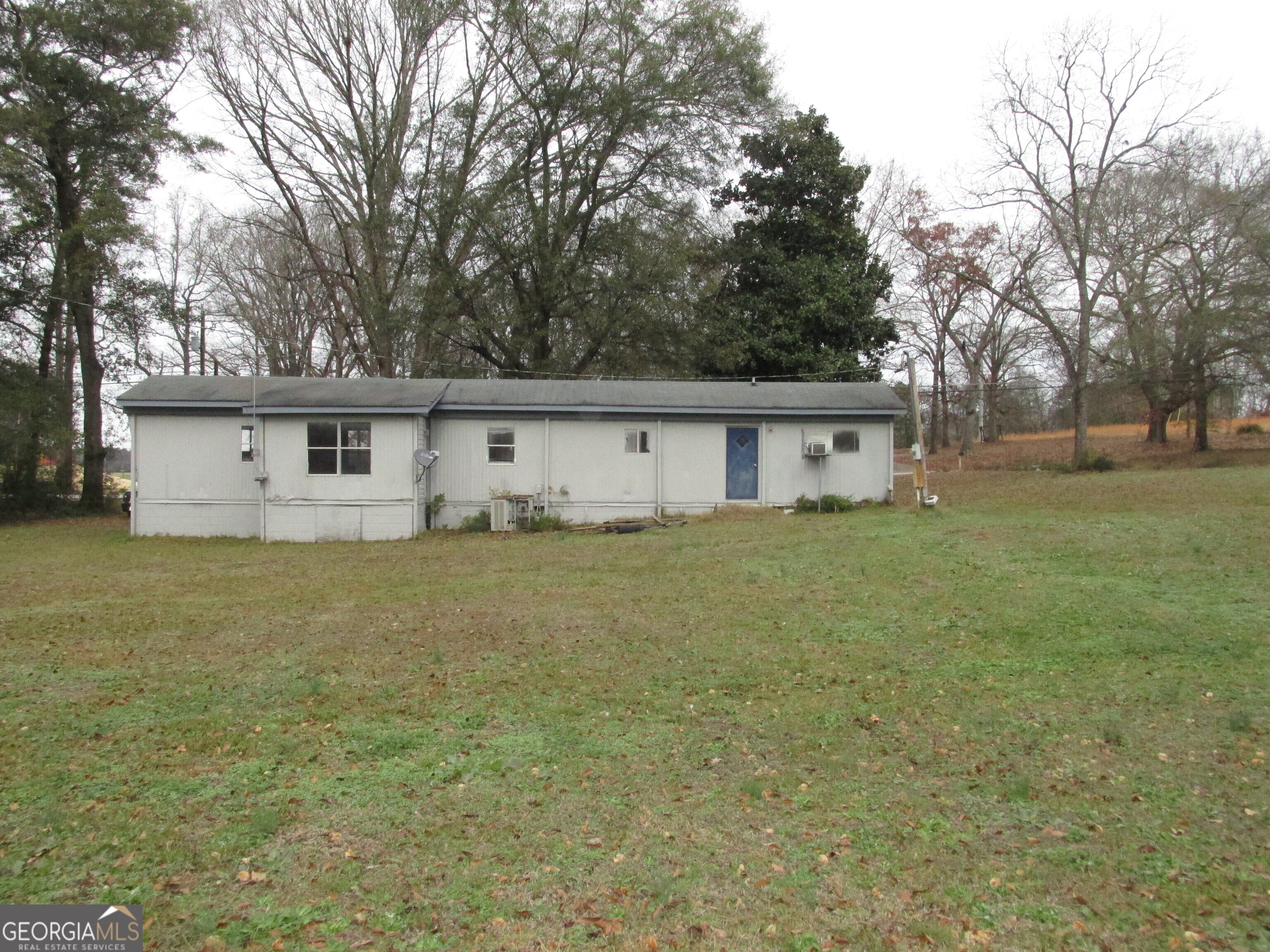 220 Carl Bethlehem Road Southwest Bethlehem, GA 30620 - Photo 11 of 11 a house view with a garden space