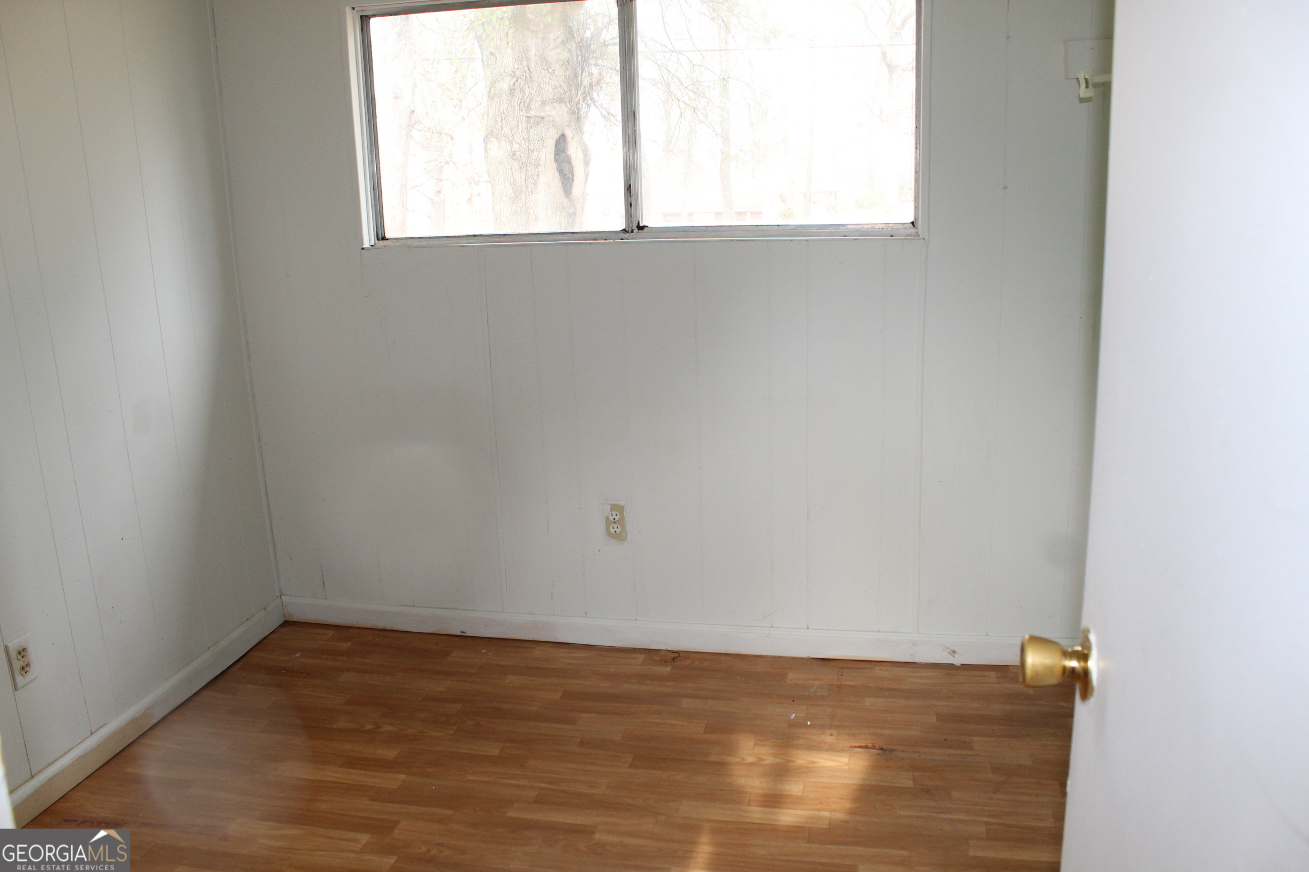 220 Carl Bethlehem Road Southwest Bethlehem, GA 30620 - Photo 8 of 11 an empty room with a window