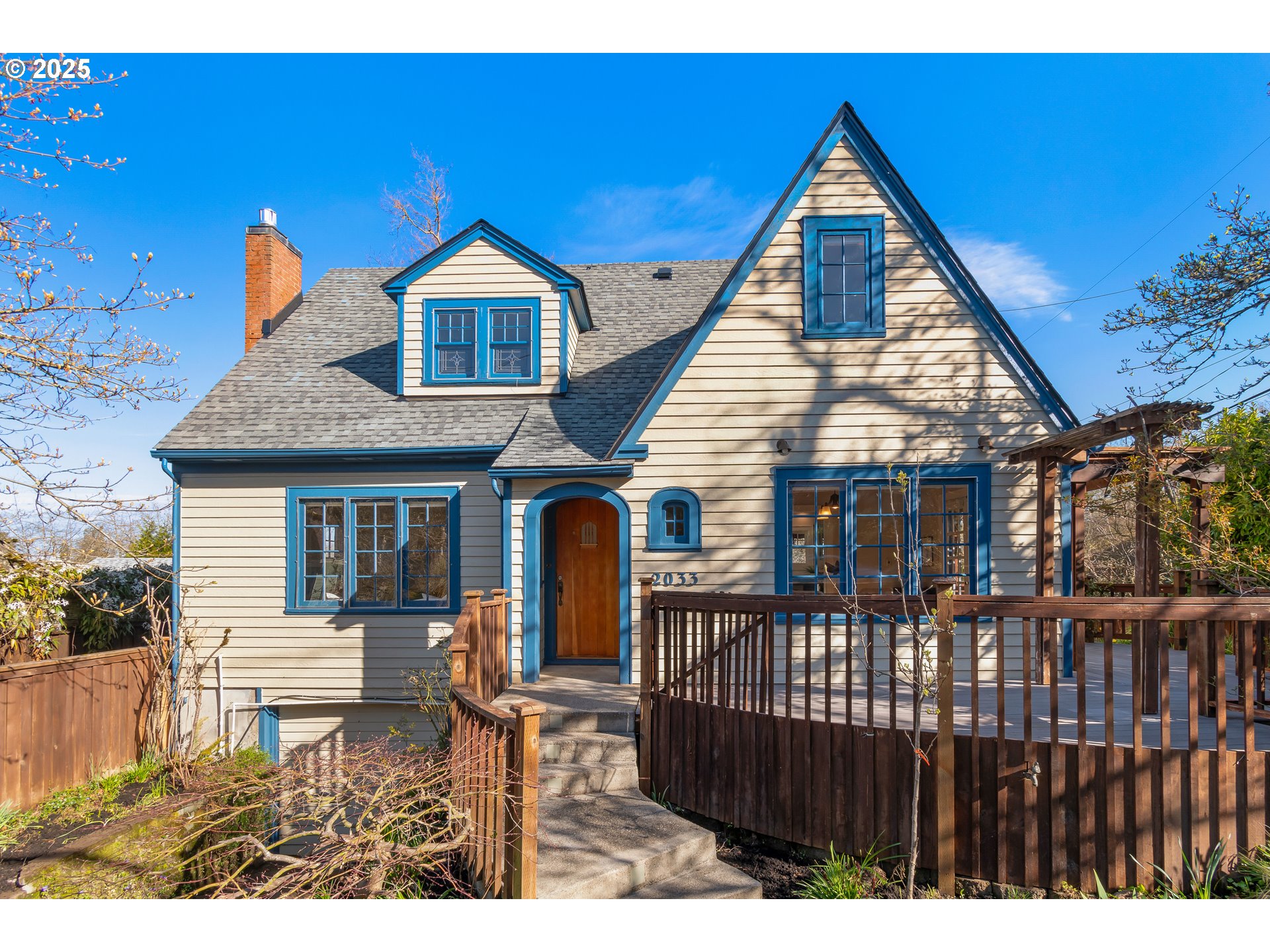2033 East 19th Avenue Eugene, OR 97403 - Photo 1 of 45 a front view of house with a garden