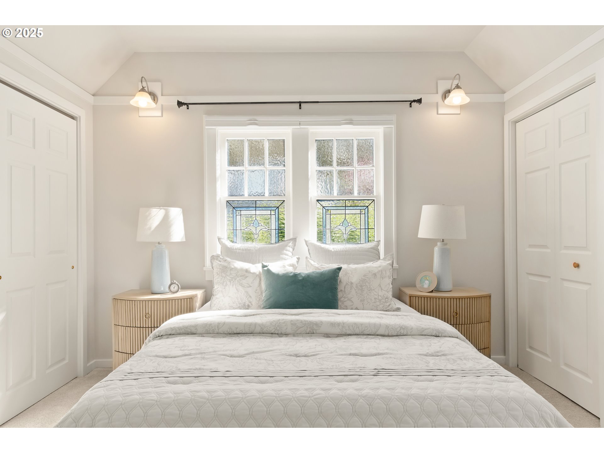 2033 East 19th Avenue Eugene, OR 97403 - Photo 22 of 45 a bedroom with a bed and a window