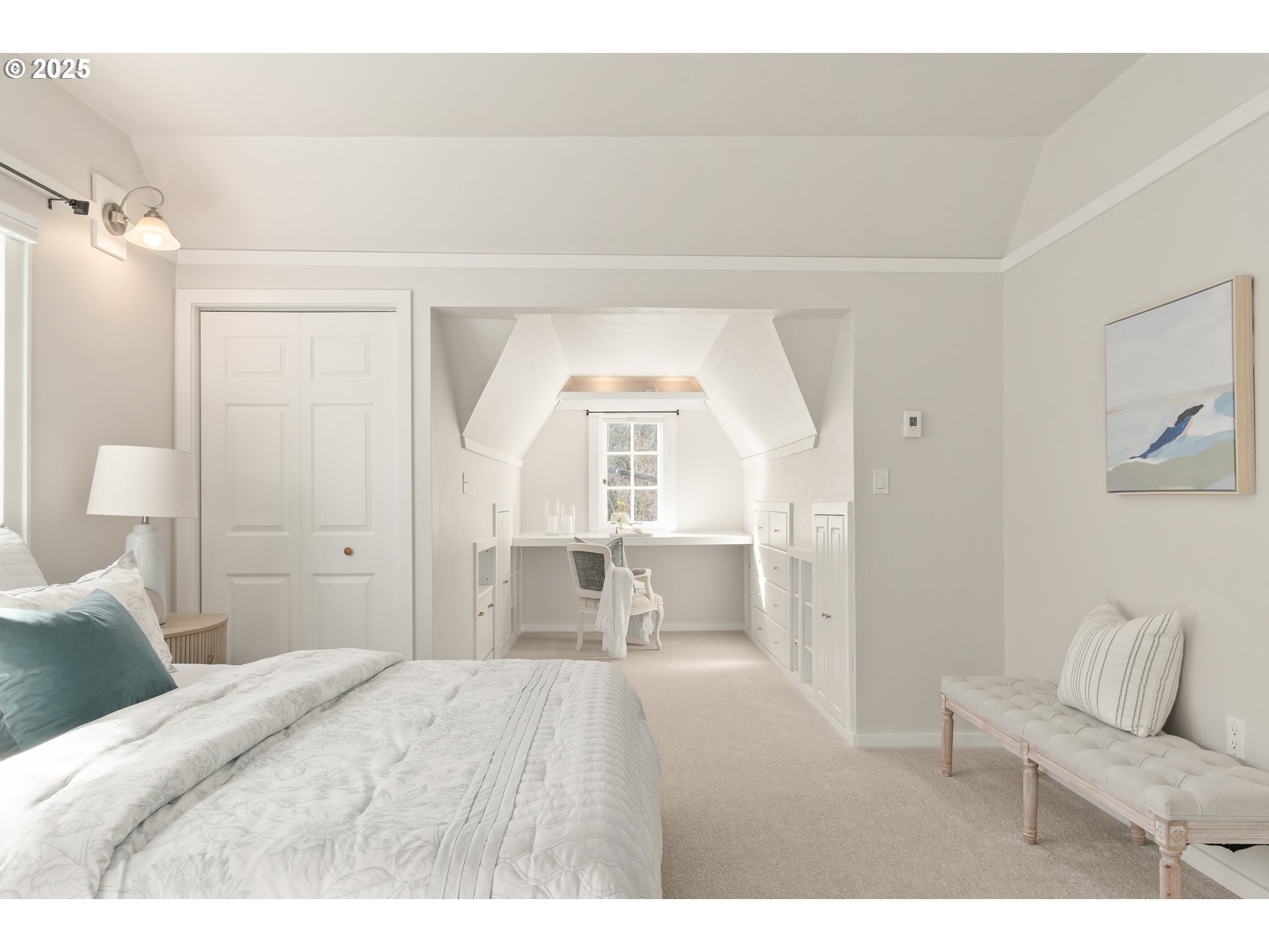 2033 East 19th Avenue Eugene, OR 97403 - Photo 23 of 45 a bedroom with a large bed and a couch