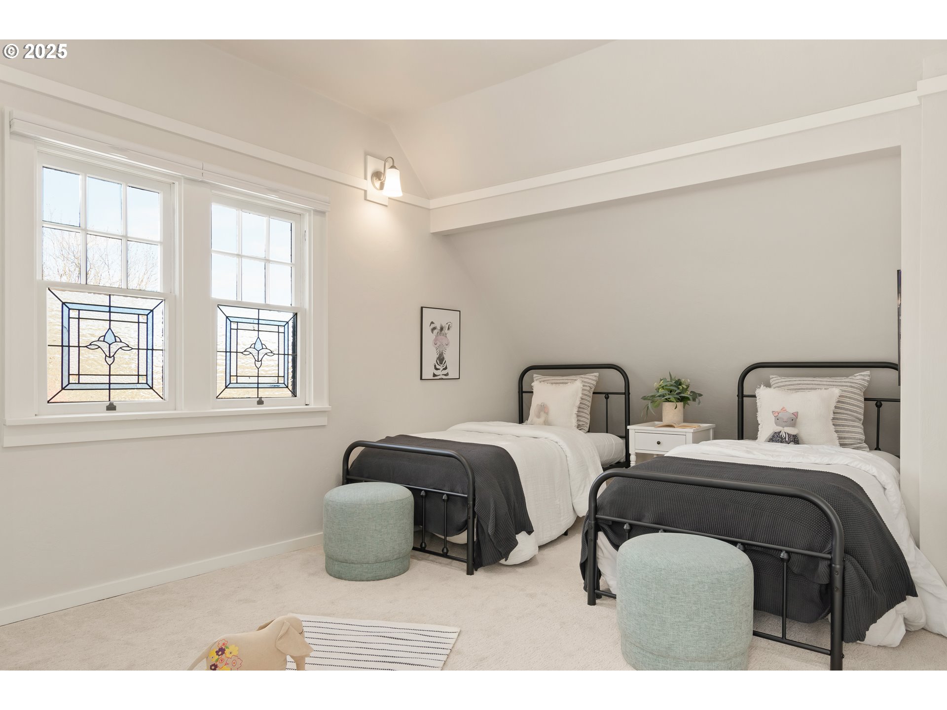 2033 East 19th Avenue Eugene, OR 97403 - Photo 25 of 45 a bedroom with two beds and a large window