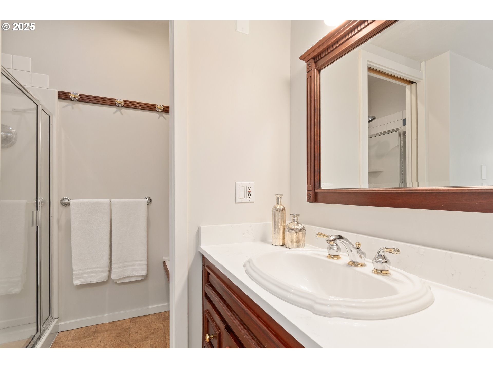2033 East 19th Avenue Eugene, OR 97403 - Photo 30 of 45 a bathroom with a sink and a mirror