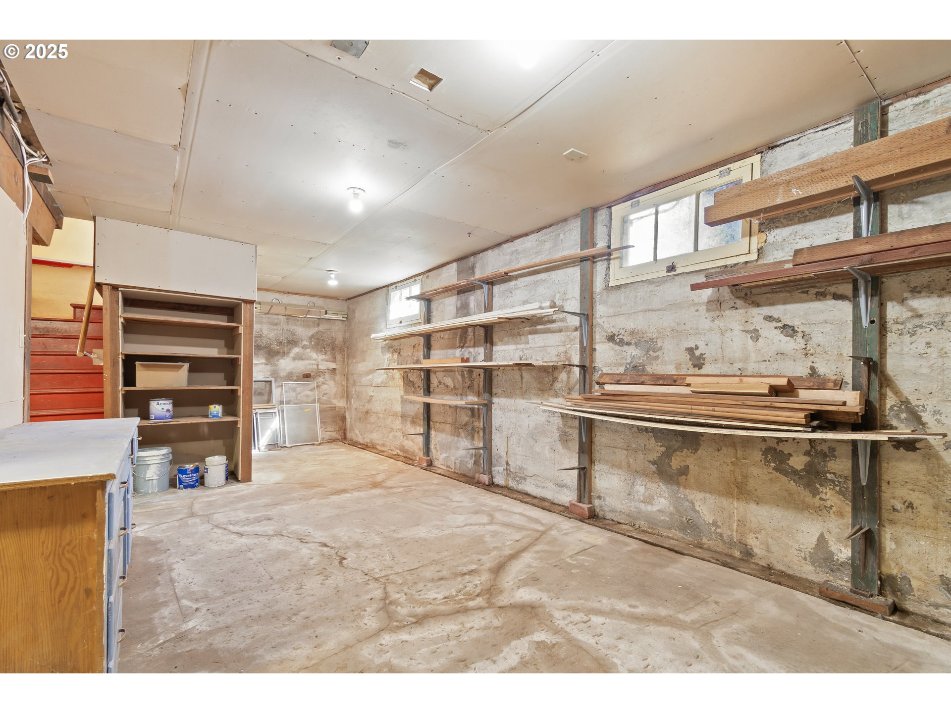 2033 East 19th Avenue Eugene, OR 97403 - Photo 34 of 45 a view of a livingroom with furniture and staircase