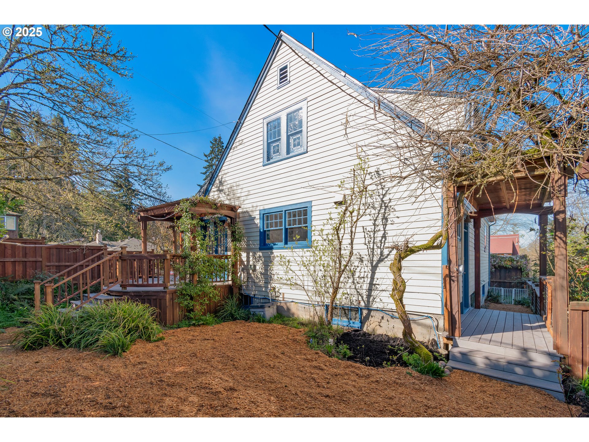 2033 East 19th Avenue Eugene, OR 97403 - Photo 40 of 45 a view of a house with a yard