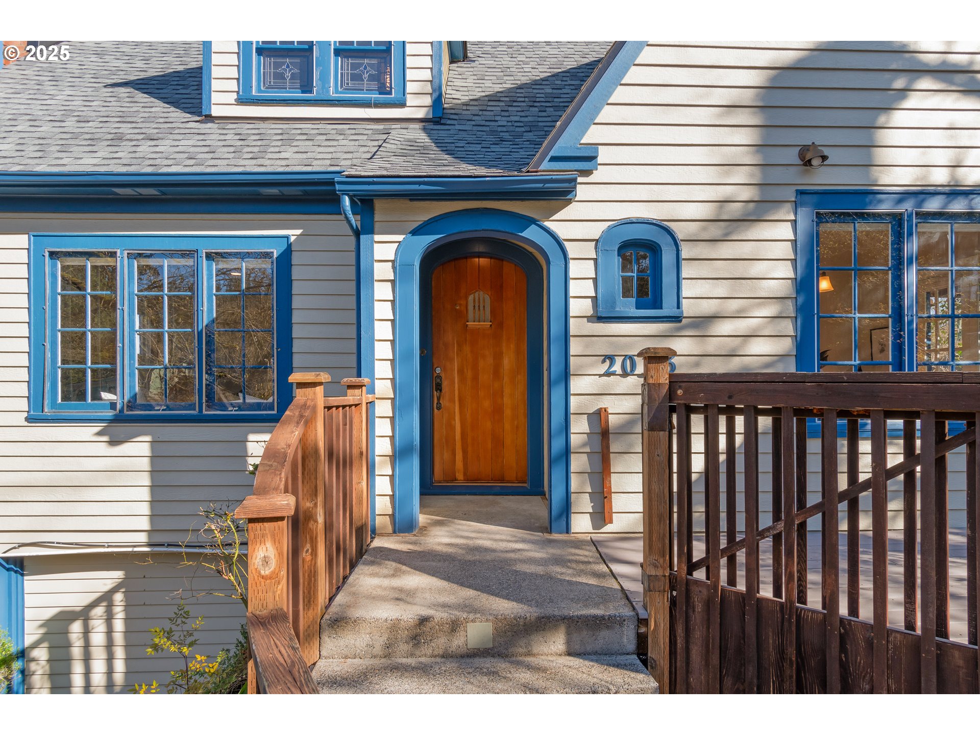 2033 East 19th Avenue Eugene, OR 97403 - Photo 4 of 45 a view of a brick house with large windows