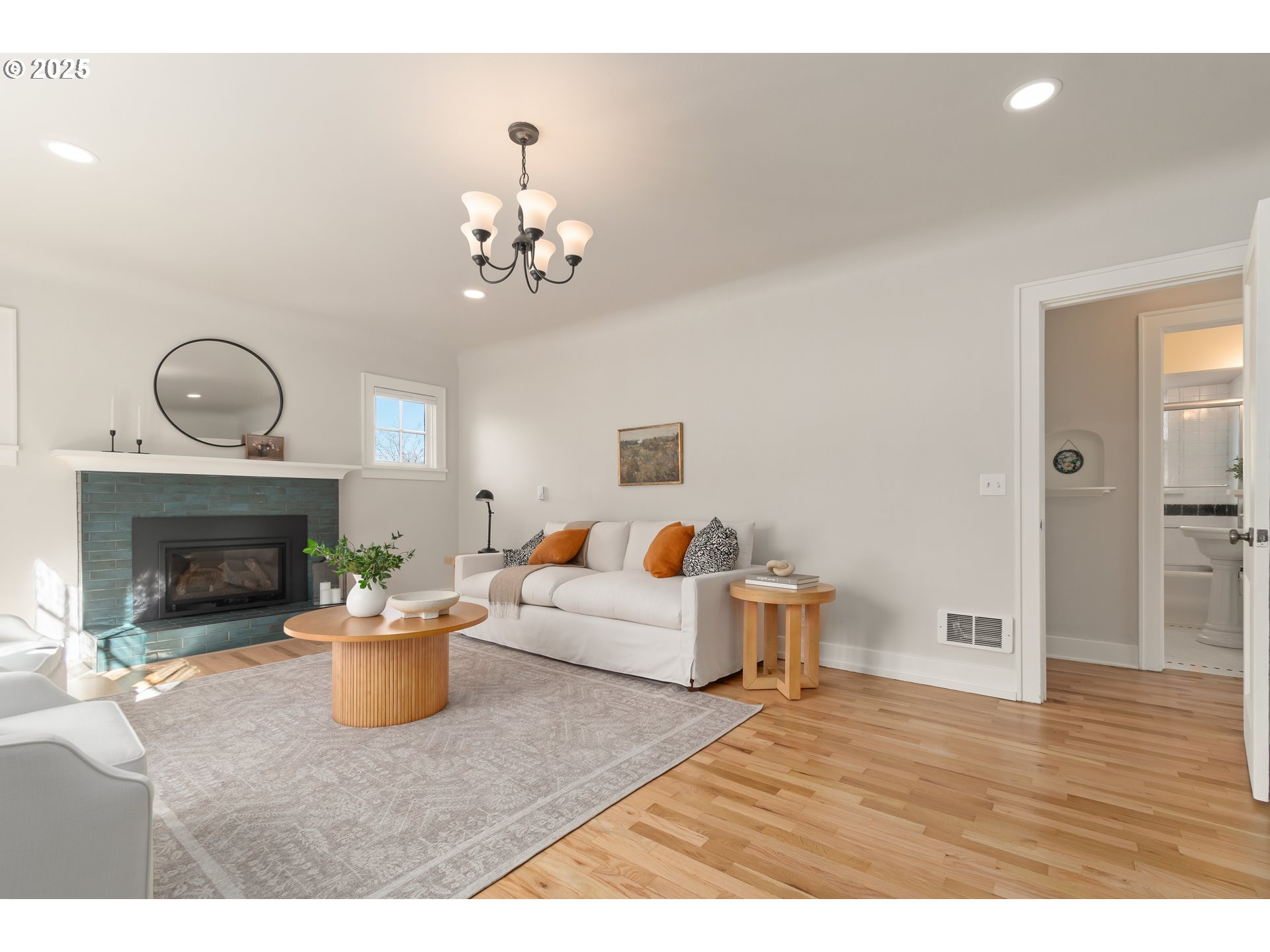 2033 East 19th Avenue Eugene, OR 97403 - Photo 8 of 45 a living room with furniture and a fireplace