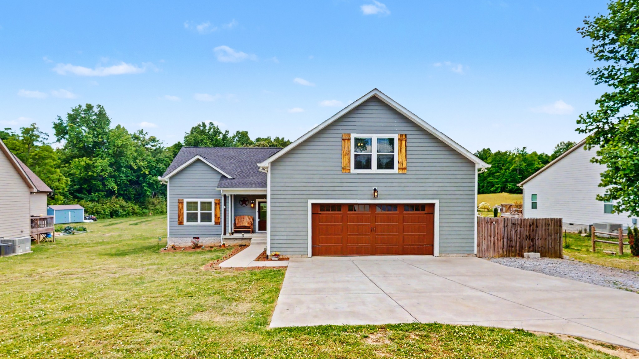 601 King Ridge Road Dowelltown, TN 37059 - Photo 1 of 49 a front view of house with yard and trees in the background