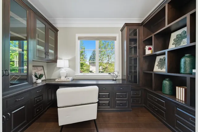 a stove top oven sitting inside of a kitchen